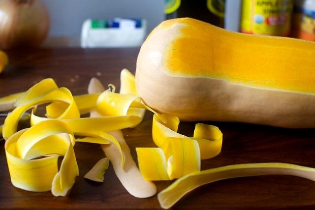peeling the squash
